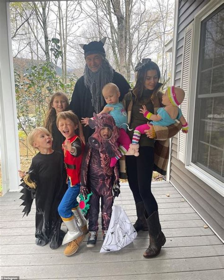 Alec and Hilaria Baldwin pose with their six kids for Halloween photos amid shooting chaos