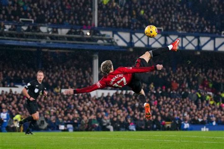 Alejandro Garnacho makes young Man United fan CRY after gifting him the boots he wore for that stunning overhead kick at Everton... and signs them with a special birthday message