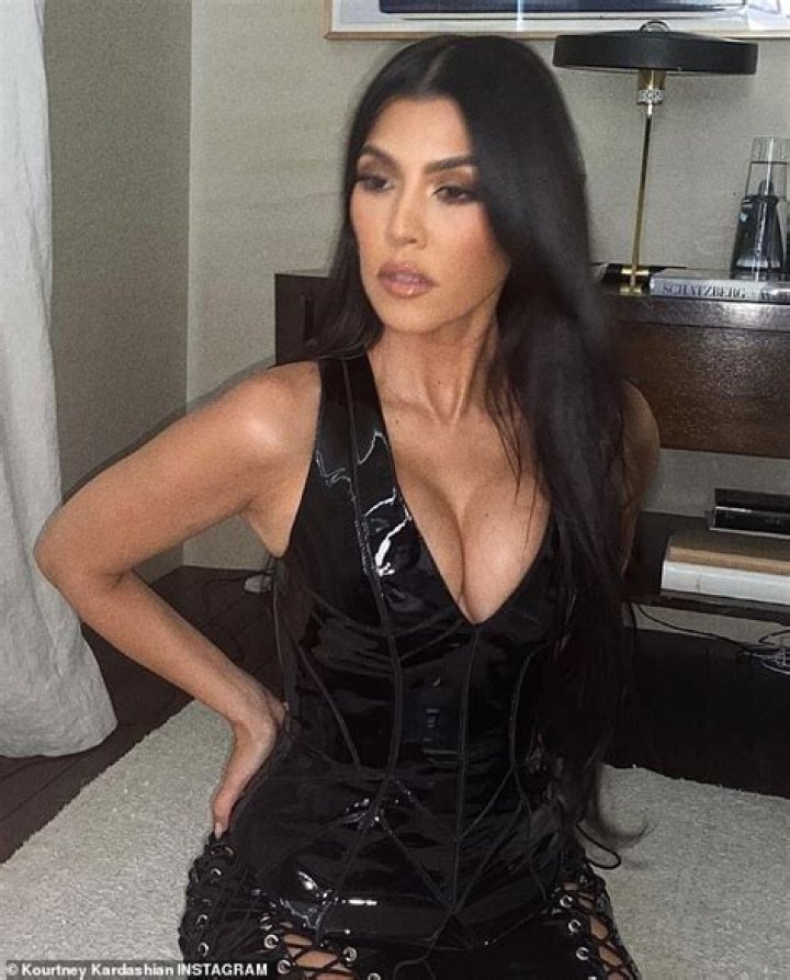 'All tied up': Kourtney Kardashian puts on an eye-popping display in a racy latex outfit