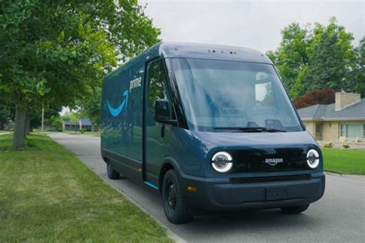 Amazon rolls out all-electric delivery trucks from Rivian in Bloomington, IL as part of company's zero-carbon pledge by 2040