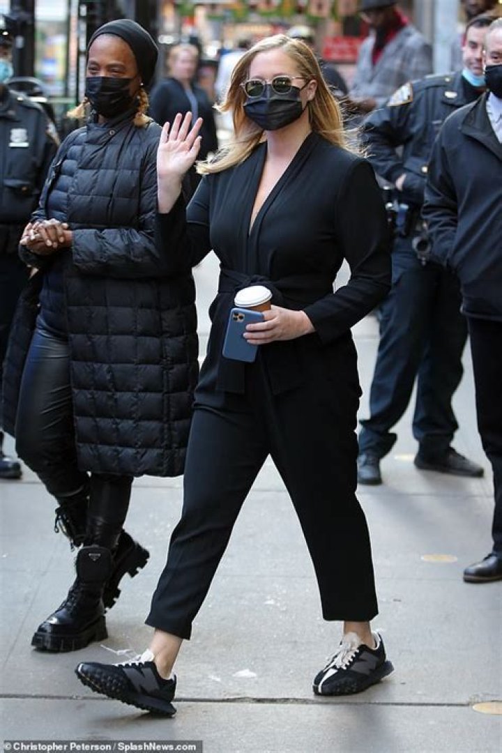 Amy Schumer dances TOPLESS as she gets fitted ahead of hosting the Academy Awards