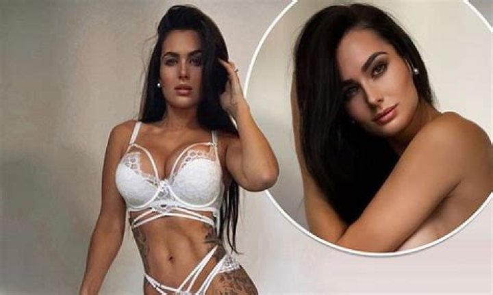 Arabella Del Busso poses topless and shows off her skimpy white underwear