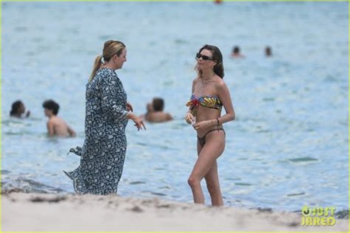 Behati Prinsloo Hits the Beach in a Bikini While Adam Levine Gets in a Workout