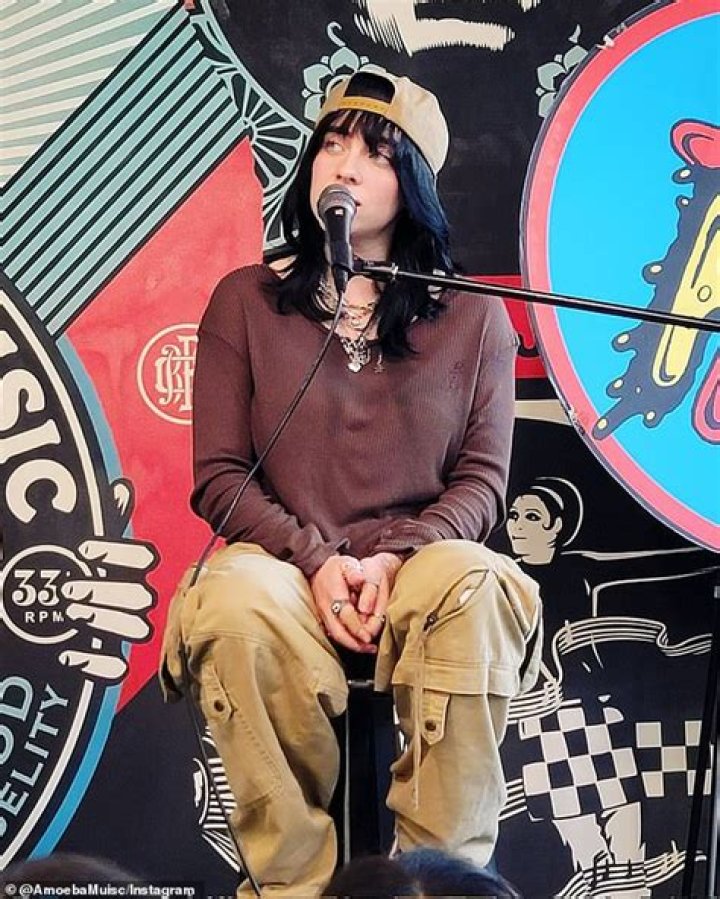 Billie Eilish poses up in an oversized blazer before taking the stage at the Hollywood Bowl