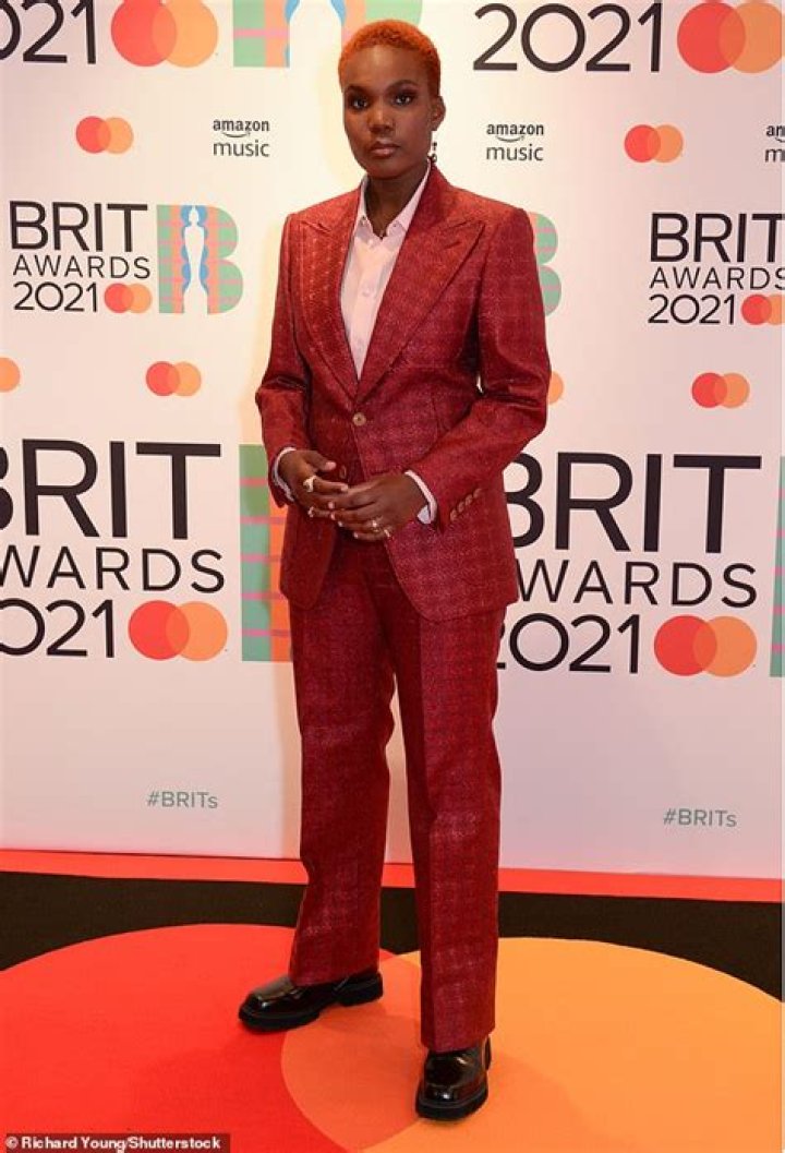 BRIT Awards 2021: Triple-nominee Arlo Parks wears sharp maroon suit on red carpet