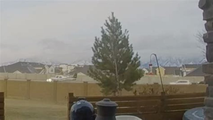 CCTV Footage Captures Plane Landing on Busy Salt Lake City Highway