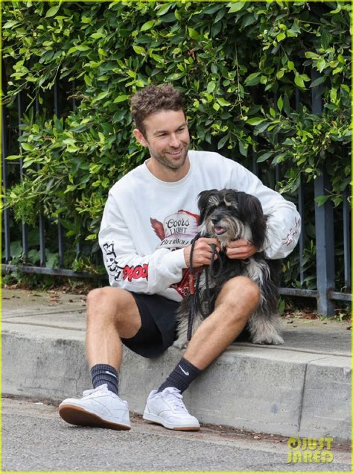 Chace Crawford Enjoys Some Cuddles with His Dog Shiner During Their Morning Walk!