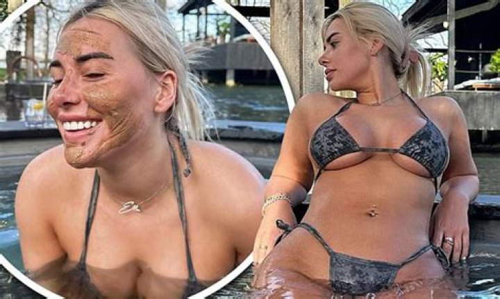 Ellie Brown turns heads as she flashes her underboob in a grey bikini while relaxing in a hot tub