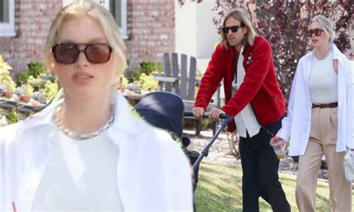 Elsa Hosk shows of her post-baby body on a stroll with her beau Tom Daly and their baby girl in LA