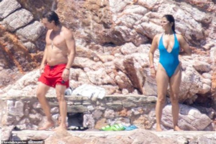 EXC: Matthew McConaughey, 52, flaunts muscles during Greek beach break with wife Camila Alves