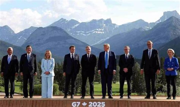 French First Lady Brigitte Macron looks elegant in a fawn suit at the G7 summit 
