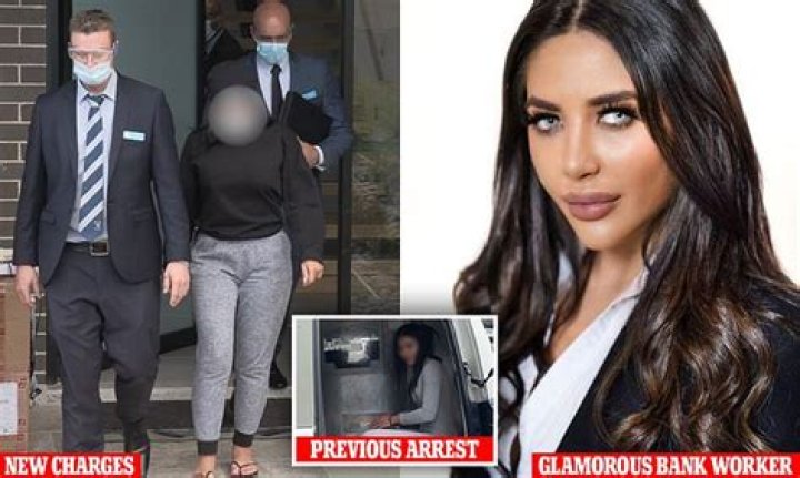 Glamorous bank worker pictured in trackies as she's arrested over alleged 'sophisticated' fraud