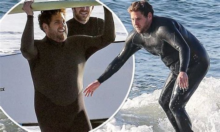 Hanging loose! Jonah Hill hits the waves near Los Angeles for a surfing trip with a friend