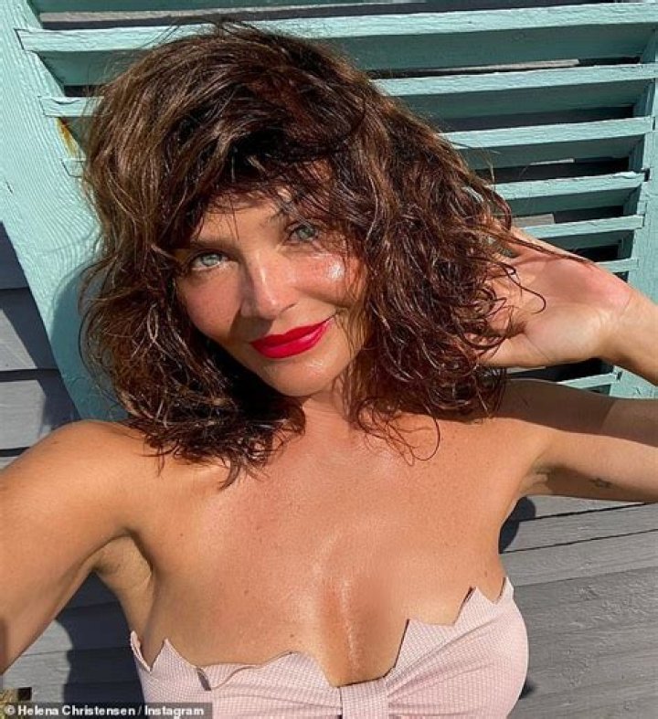 Helena Christensen, 53, poses in a busty pink bikini as she debuts chic bob hairstyle