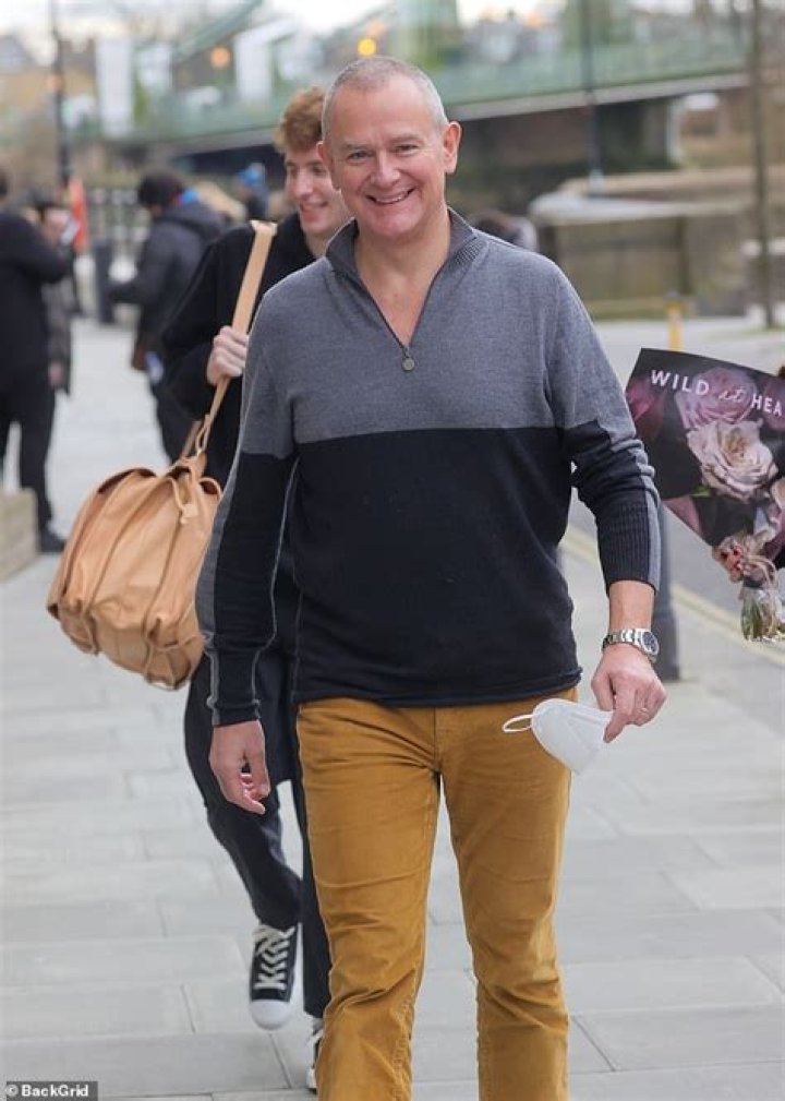 Hugh Bonneville shows off his svelte frame in a grey sweatshirt as he leaves London TV studio