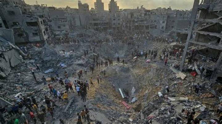 Israel bombs high-rise buildings as Gaza marks sombre Eid: Live