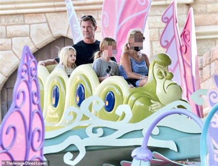 Jeff Lewis pushes daughter Monroe, four, around Disneyland in her stroller