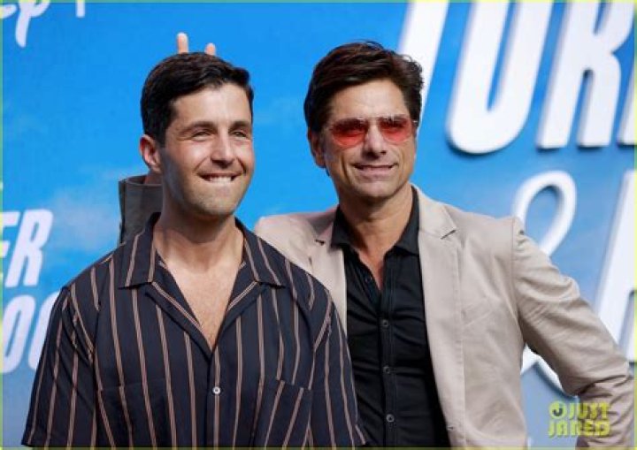 John Stamos Gives Josh Peck Bunny Ears at 'Turner & Hooch' Premiere
