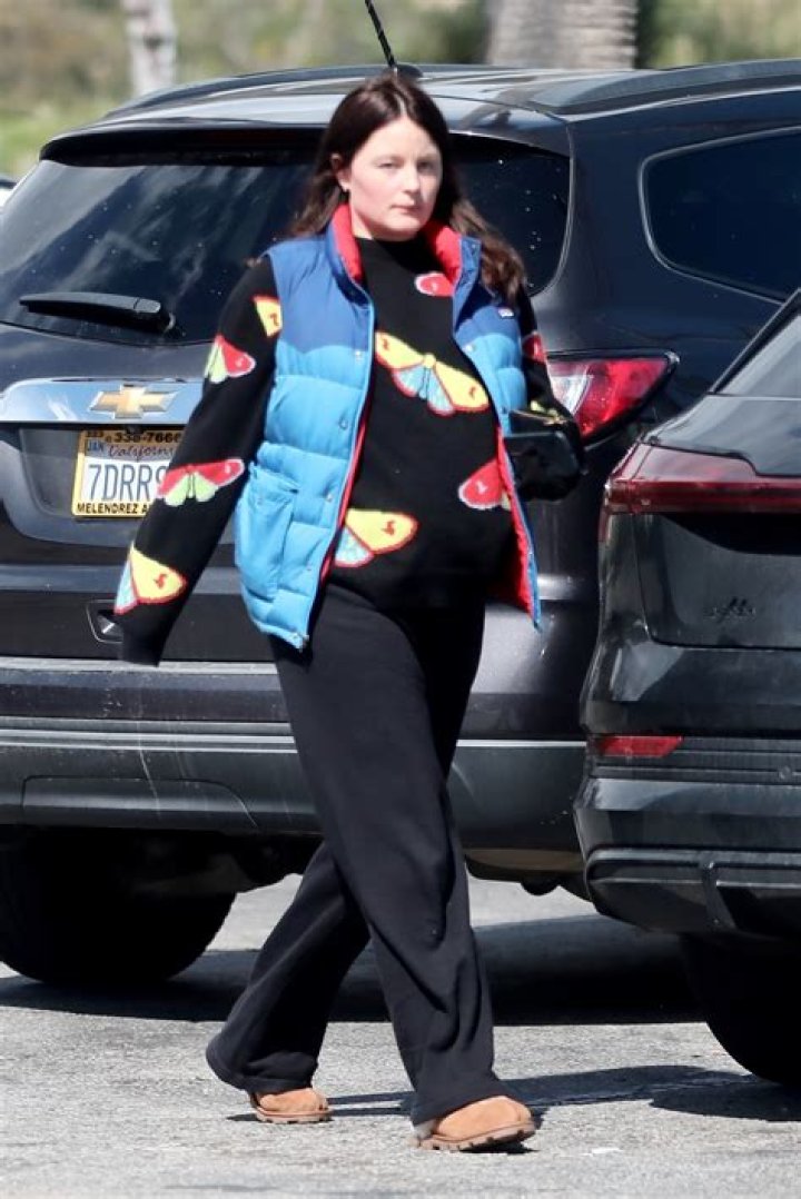 Jonah Hill's rumored fiancée Olivia Millar covers up her baby bump while stepping out in Malibu