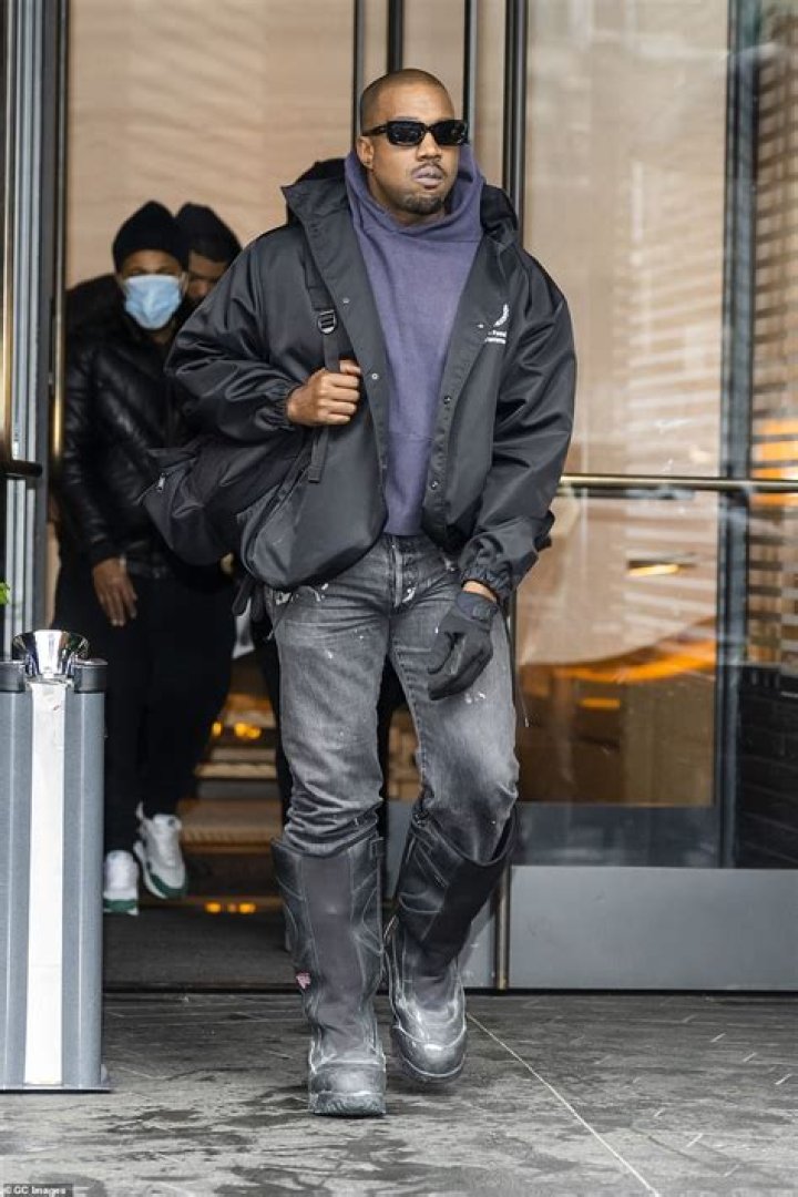 Kanye West raps in a black gimp mask in new Heaven And Hell video for Yeezy Gap label