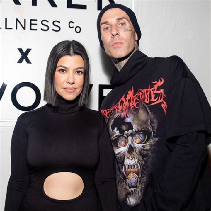 Kourtney Kardashian wears a skeleton choker as she adopts her boyfriend Travis Barker's style