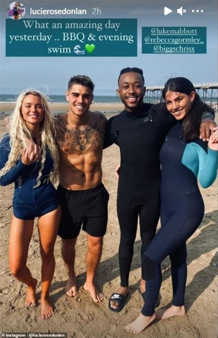 Love Island's Rebecca Gormley and Biggs Chris share a kiss during an outing in Manchester 