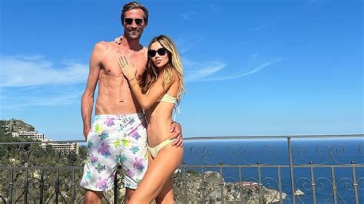 Love Island's Shelby Mills flaunts her ample assets in a skimpy yellow bikini