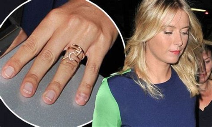 Maria Sharapova flashes her £300k diamond ring after fiancé Alexander Gilkes drops her off at LAX