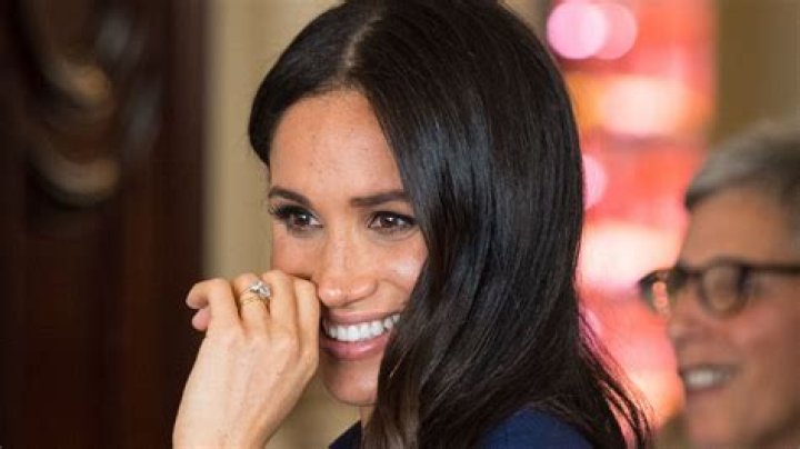 Meghan Markle sports mysterious $62,000 Lorraine Schwartz pinky ring made with 'diamonds gifted from the Middle East' as she joins Prince Harry onstage at the Invictus Games
