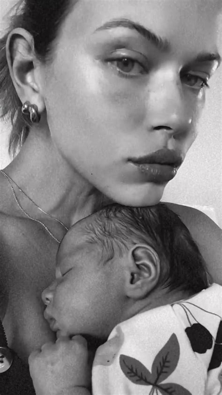 Model Georgia Fowler is a multitasking mother as she pumps breast milk for her baby Dylan at work