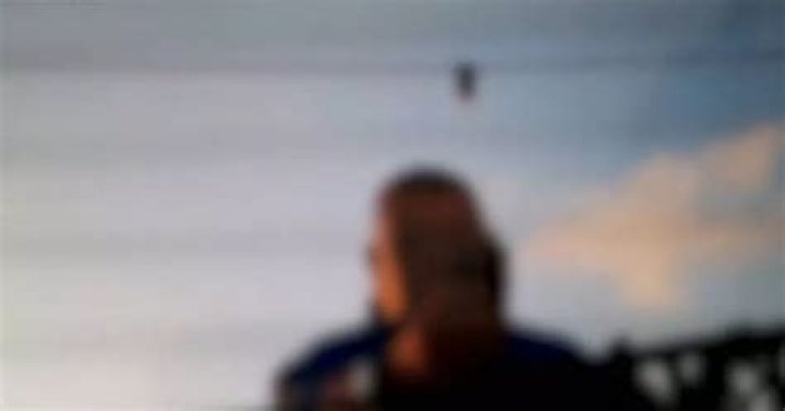 Moment furious 'nightmare hotel' neighbours catch rowdy punters filming through their windows