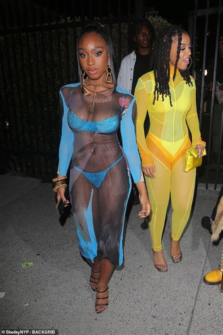 Normani flashes her blue bra and thong in a sheer dress as she leaves Doja Cat's album party