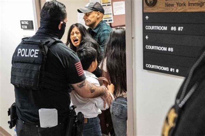 NYPD Captain is charged with smashing his girlfriend's head off his dashboard and then chasing her down after she tried to flee, dragging her back to the vehicle and repeatedly punching her