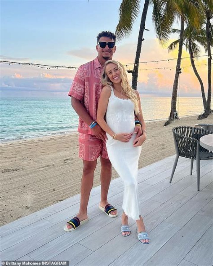 Patrick Mahomes' wife Brittany shows off her baby bump in a red dress