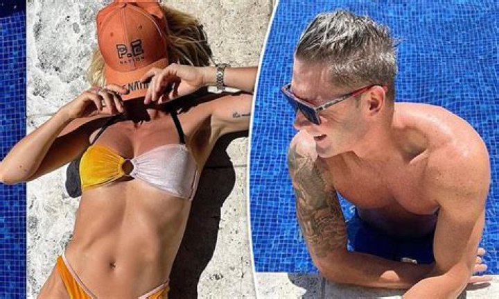 Pip Edwards and Michael Clarke enjoy a day by the pool after rekindling their romance