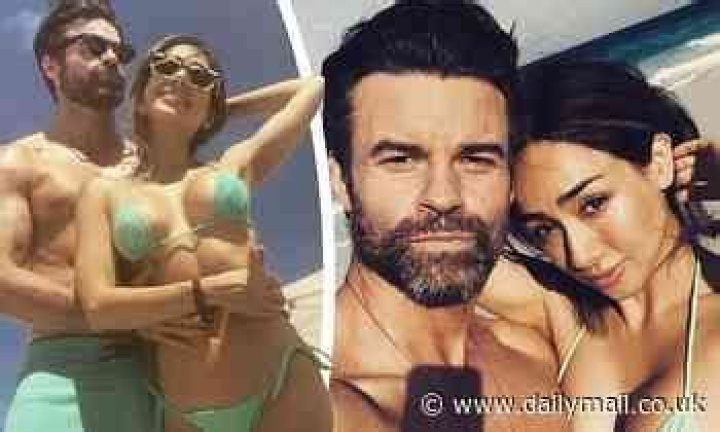 Rachael Leigh Cook's ex-husband Daniel Gillies gets cozy with new lady Julia Misaki on the beach