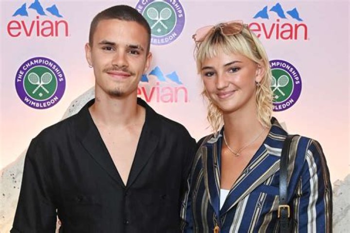 Romeo Beckham's girlfriend Mia Regan shares a sweet snap of the couple alongside a throwback picture