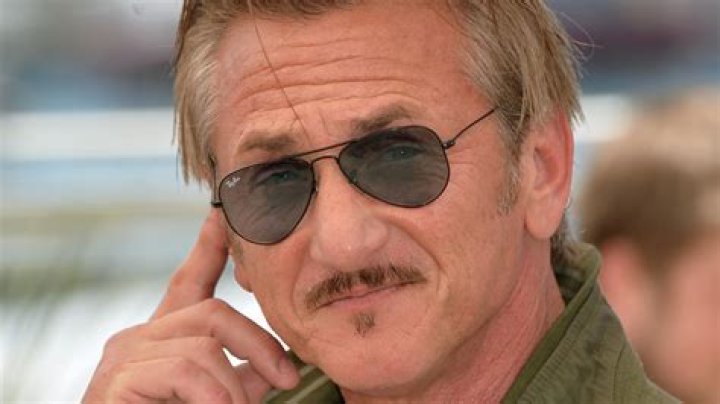 Sean Penn sports a mustache as he's seen smoking a cigarette in Miami