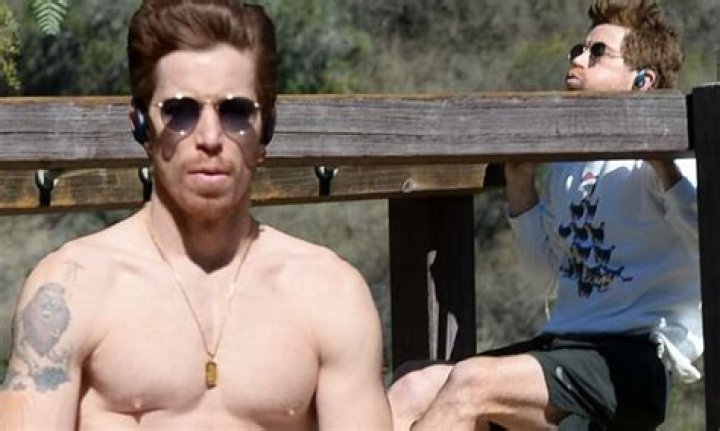 Shaun White enjoys shirtless bike ride after doing chin ups during a workout in Los Angeles