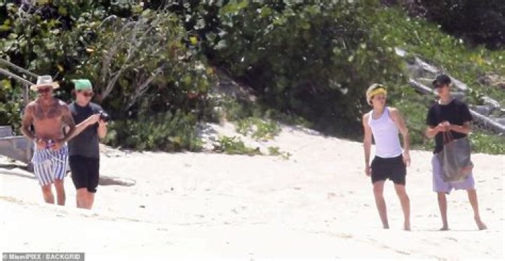 Shirtless David Beckham hits the beach with his boys Brooklyn, Romeo and Cruz in Turks and Caicos