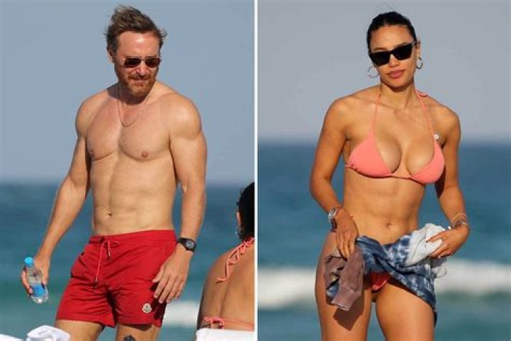 Shirtless David Guetta, 53, packs on the PDA with his bikini-clad girlfriend Jessica Ledon, 28