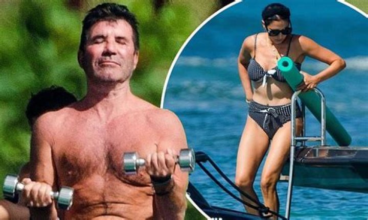 Shirtless Simon Cowell, 61, enjoys a weights session with partner Lauren Silverman, 43, in Barbados
