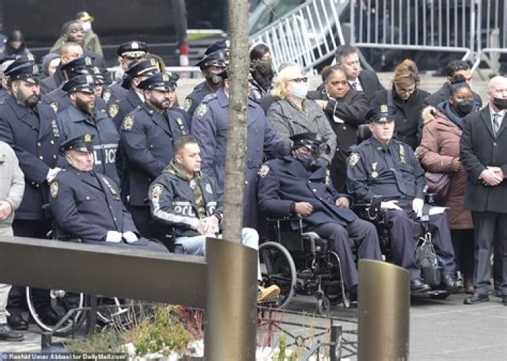Somber NYPD gathers to honor a fallen brother killed in Harlem