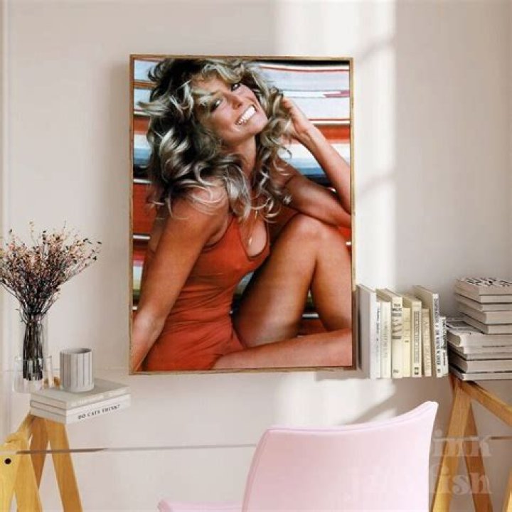 The Real Story Behind Farrah Fawcett's Iconic Red Swimsuit Poster