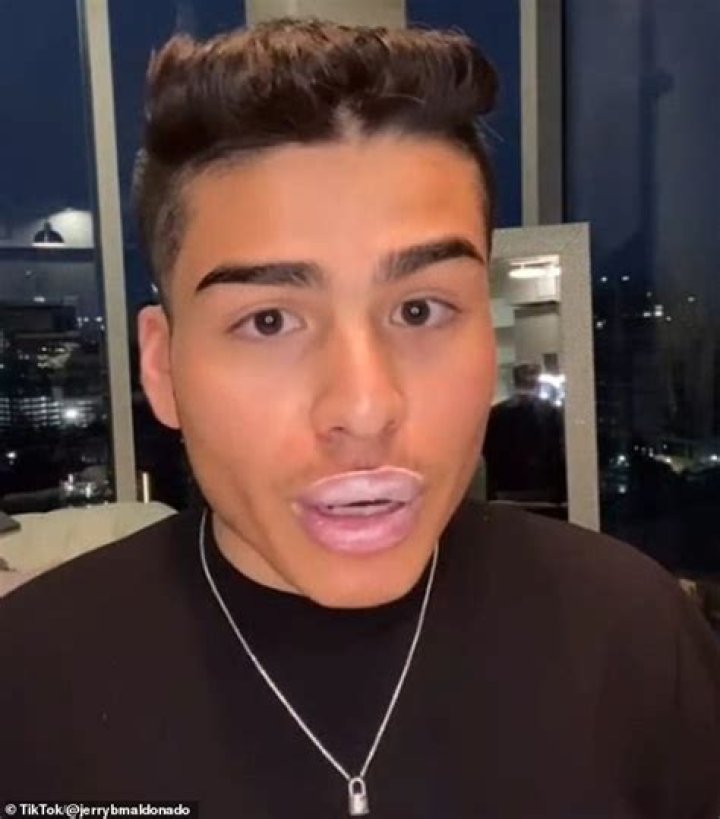 TikTok user slathers ERECTION CREAM on his mouth to make his lips look plumper