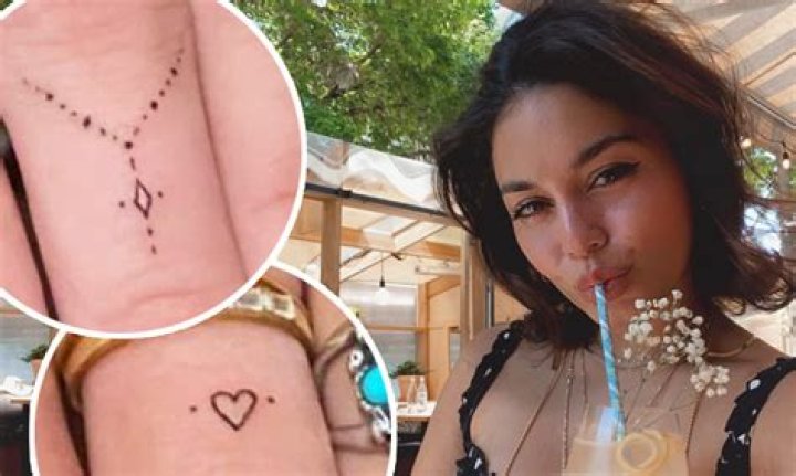 Vanessa Hudgens shows off new micro tattoos on her fingers and ear in images posted to Instagram