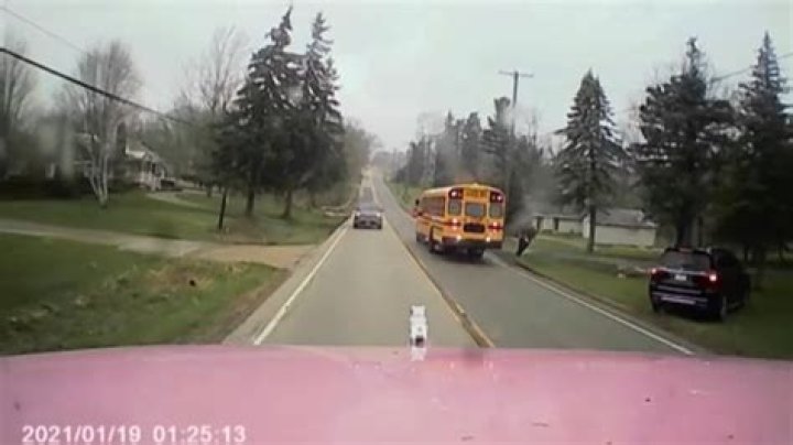 Video Footage: Out of control truck nearly hits school bus filled with kids in Cleveland, Ohio