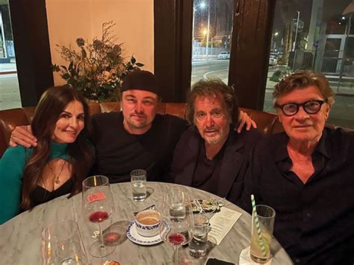 Who was Robbie Robertson's wife, Janet Zuccarini, and how many children did The Band guitarist have?