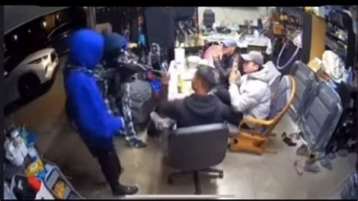 Wild moment three Vietnamese men gambling in Tacoma Washington garage overpower two armed robbers trying to stick up their game